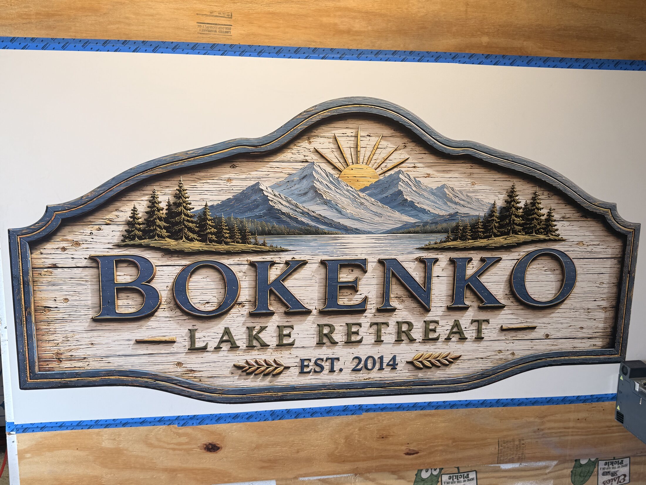 The completed Bokenko Lake Retreat artwork printed at full scale on PVC panel board