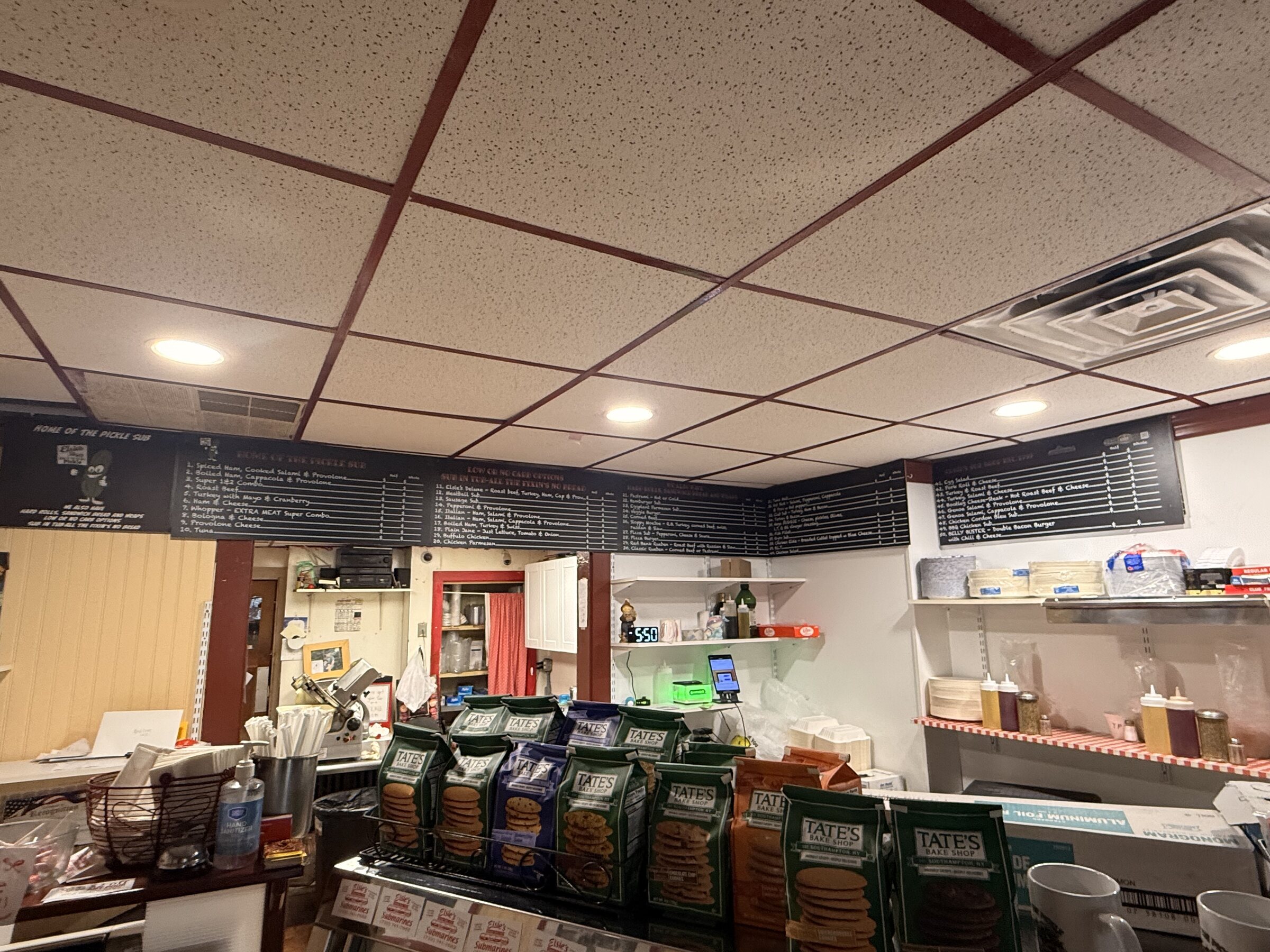 Wide shot of the shop interior showing the comprehensive graphic treatment