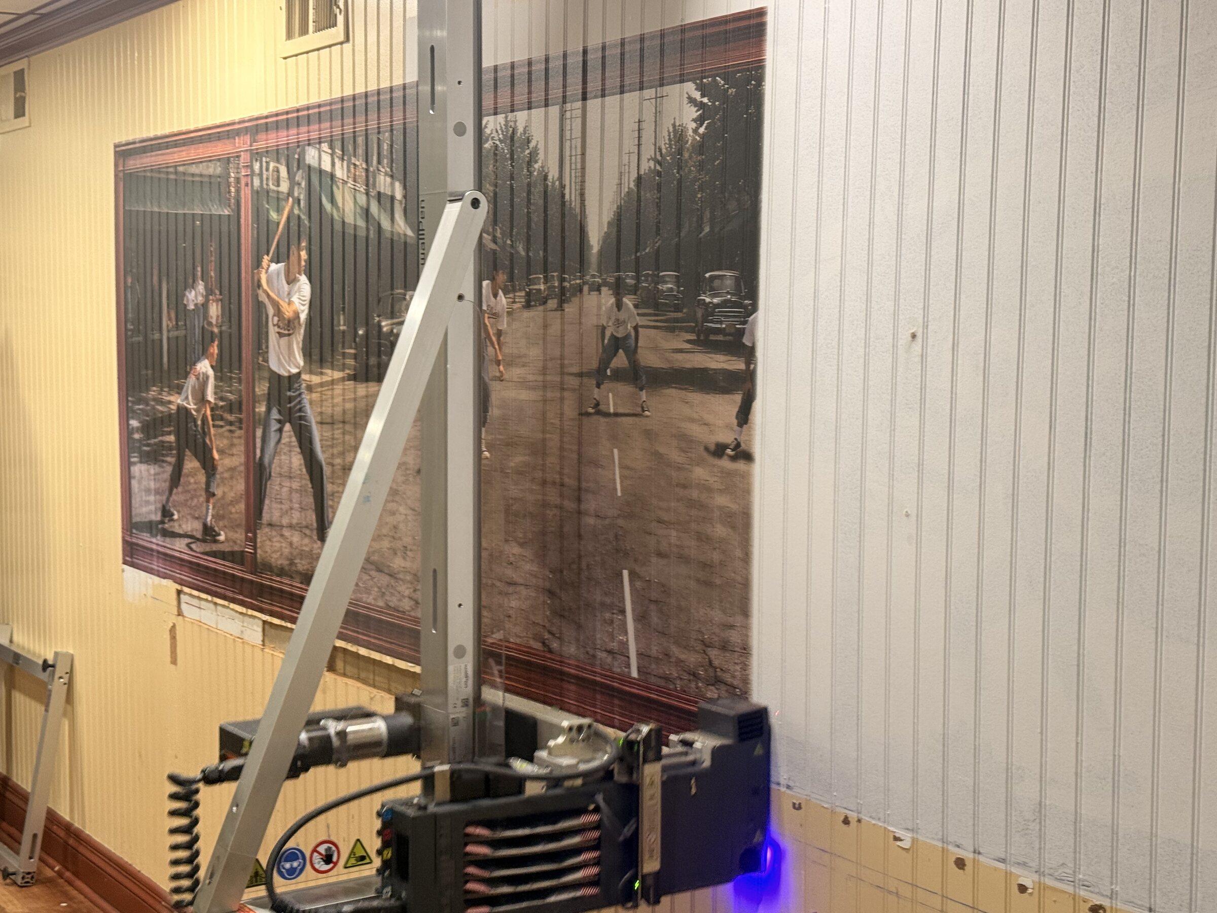 UAF wall-printing equipment set up inside Elsie's Sub Shop