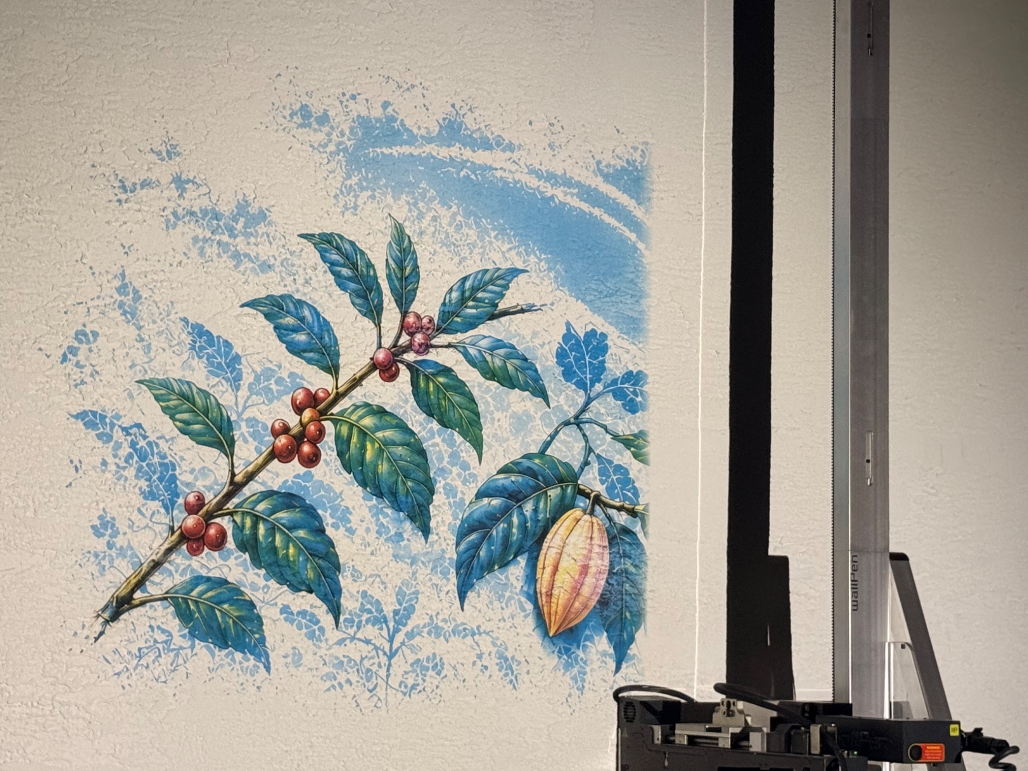 Middle printing stage of the Garden of Eatin’ artwork on the exterior stucco wall